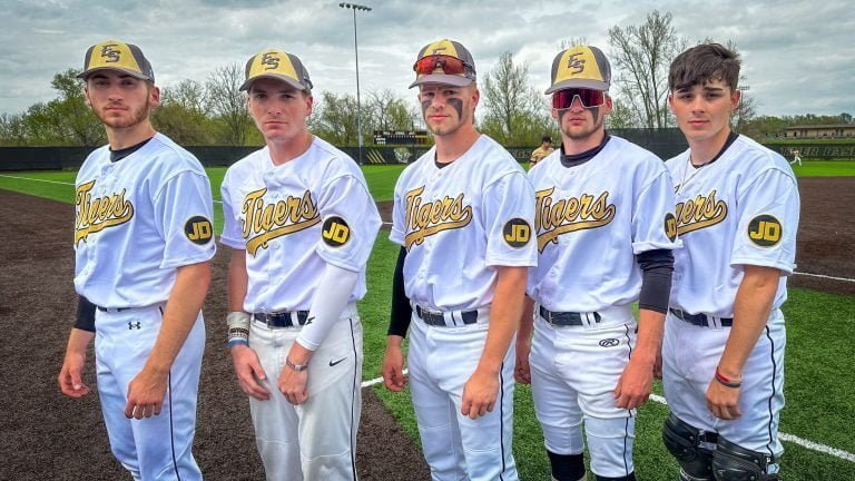 Honoring a Legend: Jim Dusek Memorial Bench and Uniforms Unveiled at Excelsior Springs High School