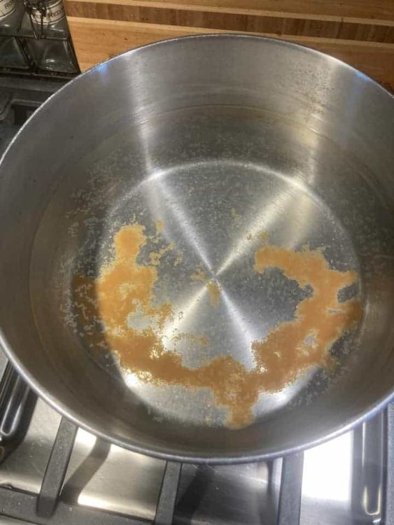 pan with dirty water in it during a boil advisory