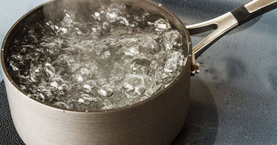 water boiling in a pan on a stove
