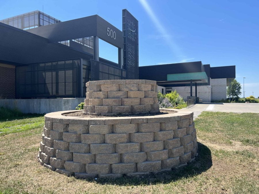 Chad Clevenger constructed a base for a tree statue that will be installed here in front of the Excelsior Springs Community Center