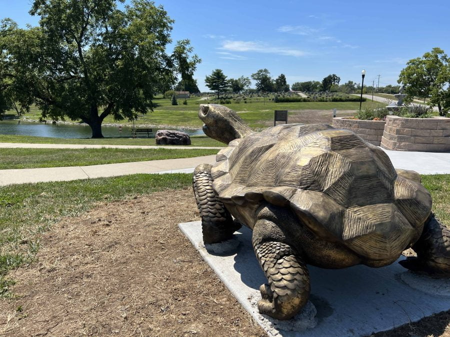 Bronze turtle statue overlooking Century Lake in Excelsior Springs