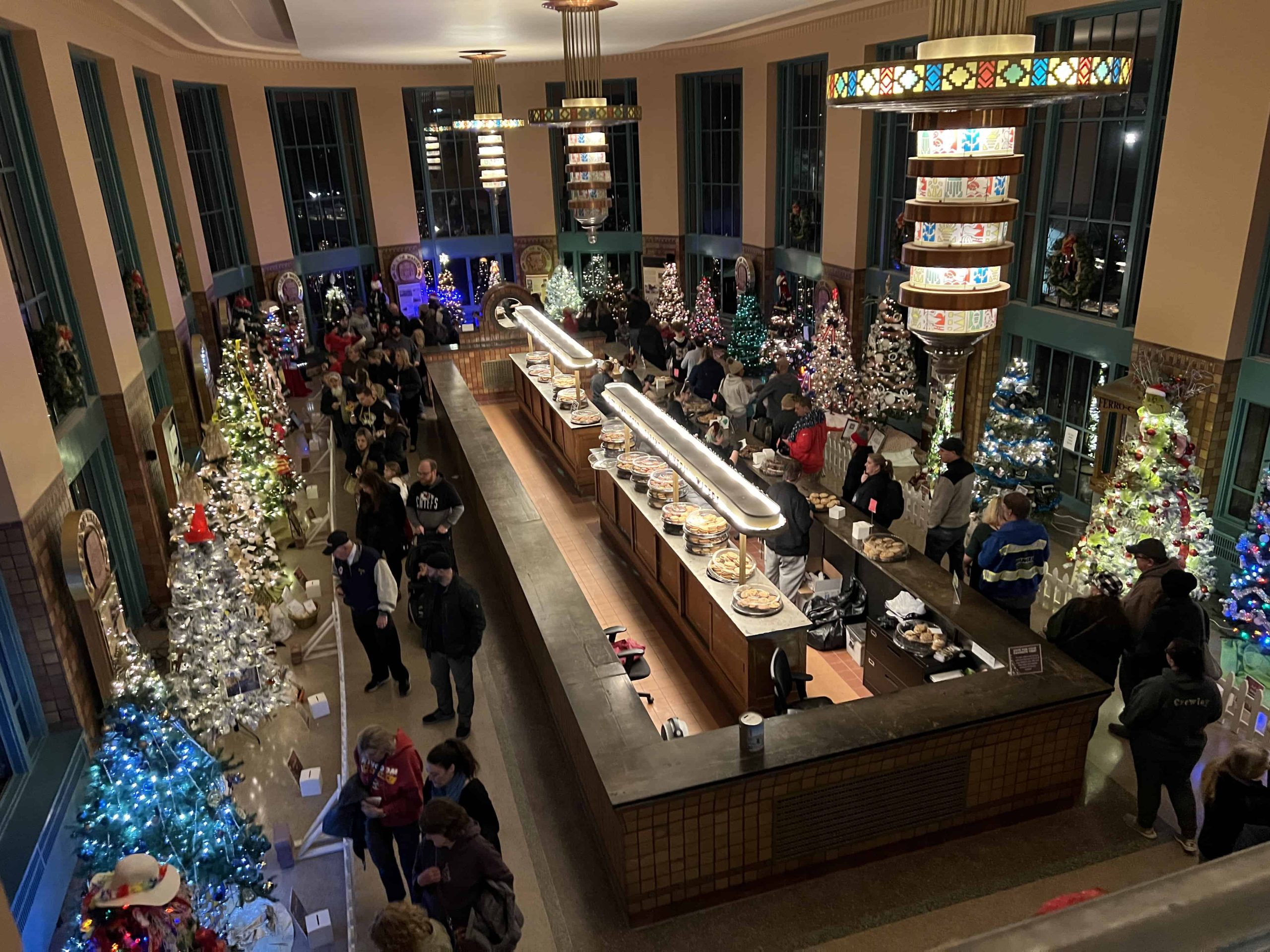 Hall of Waters waterbar surrounded by beautifully decorated Christmas trees