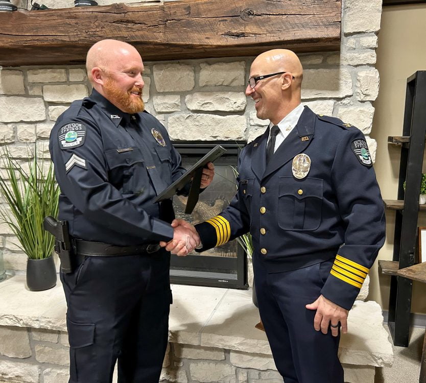 Corporal Linard receives the Commedation Award from Chief Gregory Dull