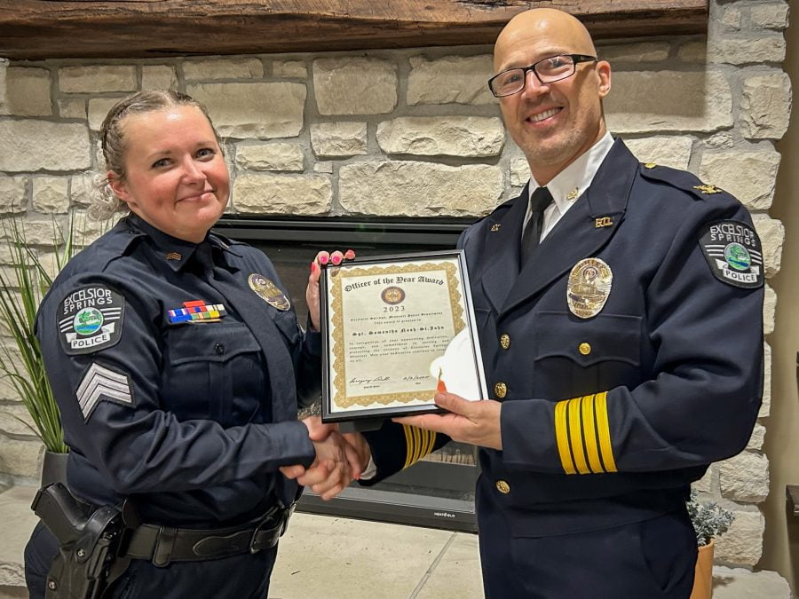 Sgt Nash-St. John and Chief Dull Officer presenting Officer of the Year Award