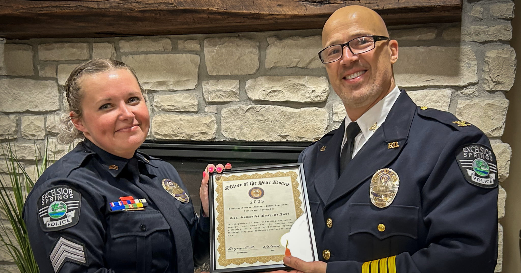 Sgt Nash-St. John and Chief Dull Officer presenting Officer of the Year Award