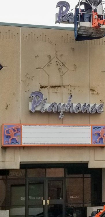 Paradise Playhouse sign being taken down off the front of the Firefly Theatre