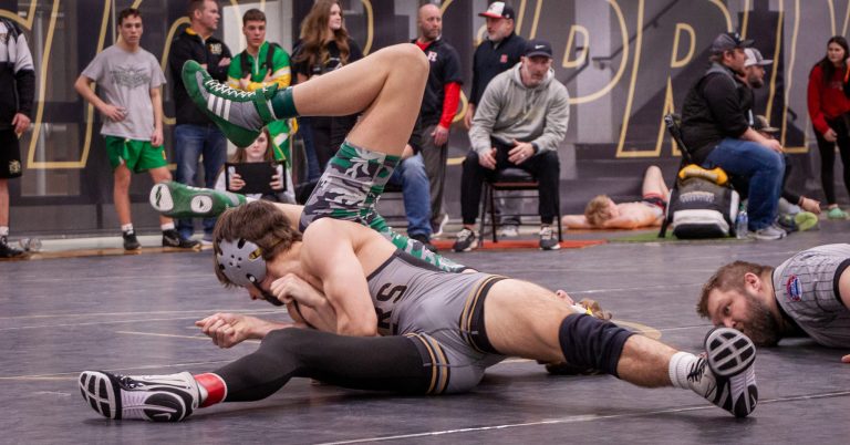 State Dreams Alive for Excelsior Springs Wrestlers After Fierce District Competition
