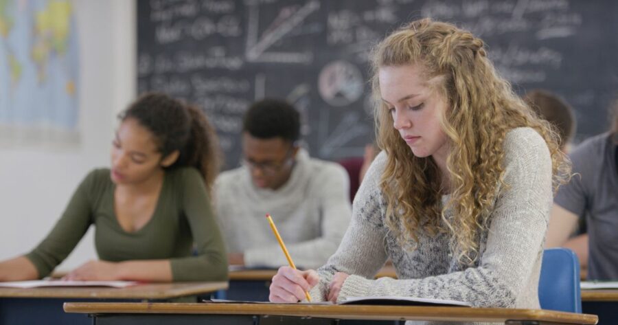 students at desks in school