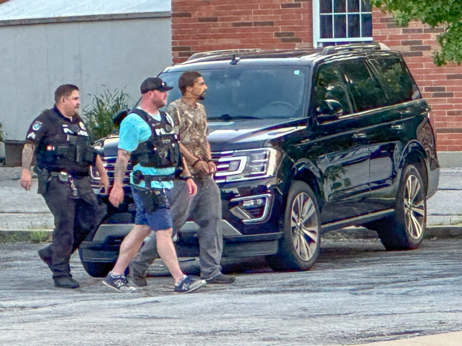 Police escort Sean-Paul Maupins