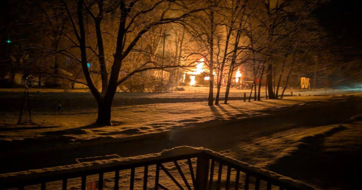 The Loftis family home on fire