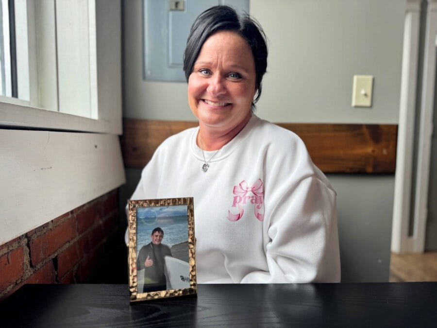 Jenny Howard with photo of her son, Gage