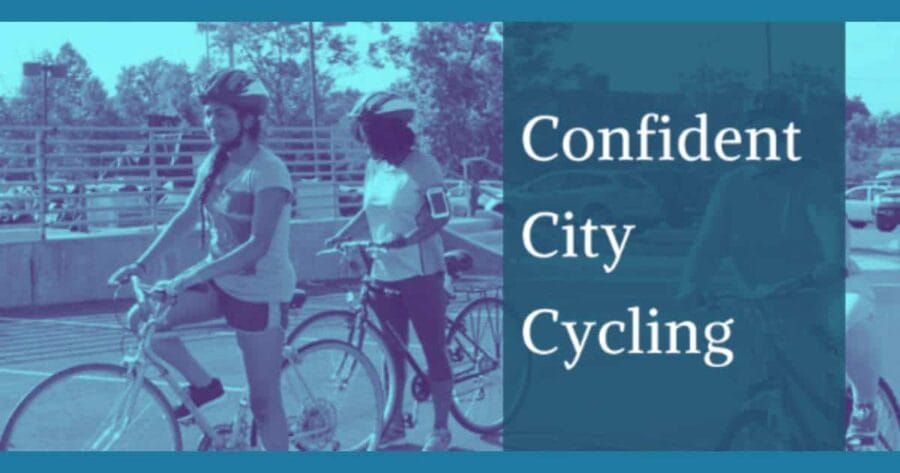 Confident City Cycling with two women bicycling in a parking lot