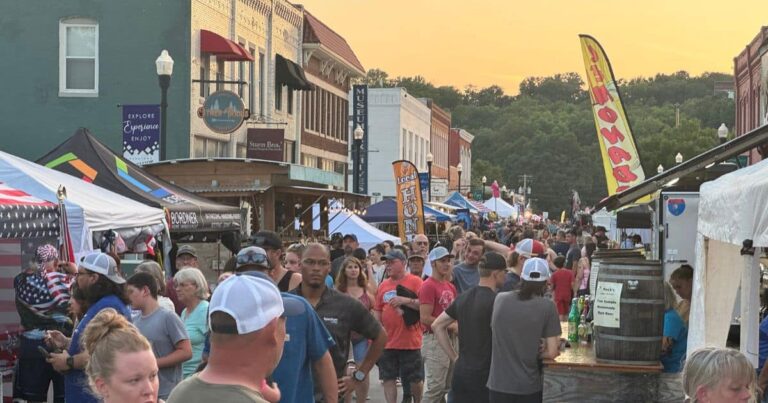 Broadway Ave in downtown Excelsior Springs with the city street packed with people during the Waterfest summer festival