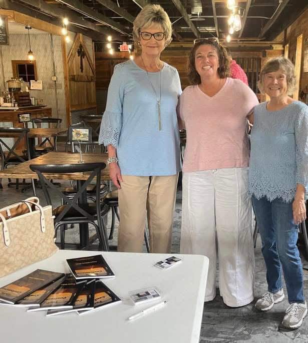 Angela Williams Glenn and teachers Sheila Gatlin and Linda McCollum
